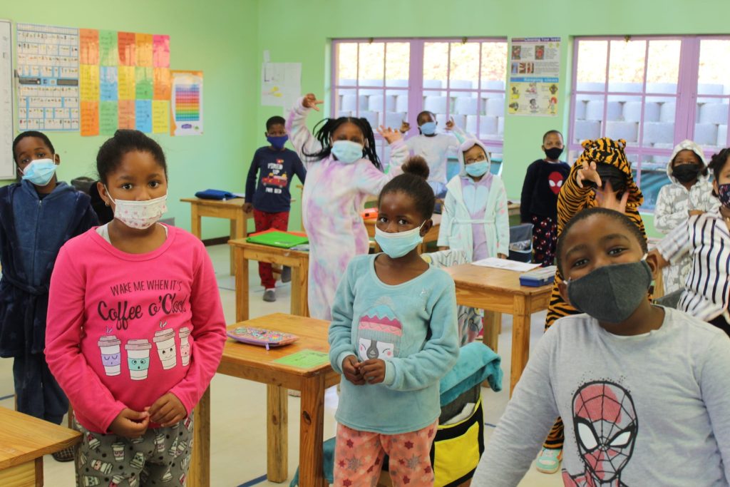 Young learners working together in a classroom